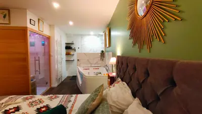 Cuisine ou kitchenette dans l'établissement Votre Escale Jungle Sauna & Spa