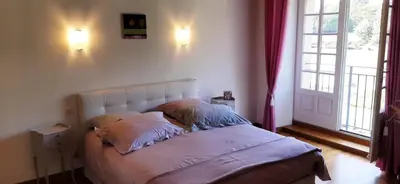 Un ou plusieurs lits dans un hébergement de l'établissement Domaine de la Basse Bobinière - Gîte et Chambres d'hôtes