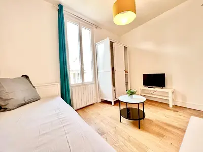 Un ou plusieurs lits dans un hébergement de l'établissement Le Colorado, studio à 5 min du centre-ville