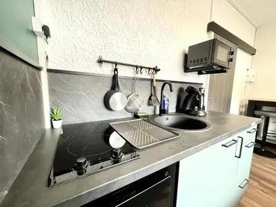 Cuisine ou kitchenette dans l'établissement Magnifique studio ~Hipster~ porte du Futuroscope