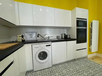Cuisine ou kitchenette dans l'établissement L'Amiral T3 de 100m2 tout neuf