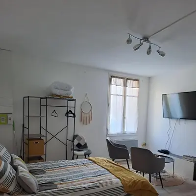 Télévision ou salle de divertissement dans l'établissement Studio de charme