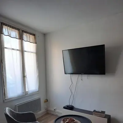 Télévision ou salle de divertissement dans l'établissement Studio de charme