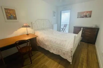 Un ou plusieurs lits dans un hébergement de l'établissement Nice 66m with terrace in La Rochelle