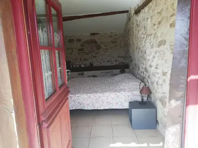 Un ou plusieurs lits dans un hébergement de l'établissement AUBERGE LA BOUCHOLIERE
