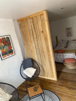 Un ou plusieurs lits dans un hébergement de l'établissement La Maison du Commandeur
