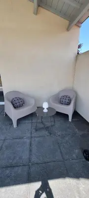 Coin salon dans l'établissement Adorable gîte au calme
