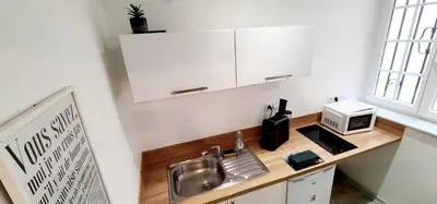 Cuisine ou kitchenette dans l'établissement Yellow Studio - Poitiers Coeur de ville