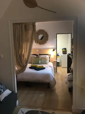 Un ou plusieurs lits dans un hébergement de l'établissement Cosy & Tendance Spa