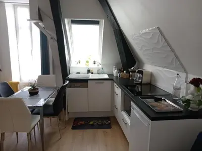 Cuisine ou kitchenette dans l'établissement Cosy & Tendance Spa
