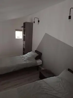 Un ou plusieurs lits dans un hébergement de l'établissement Logement moderne