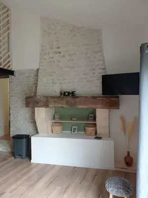 Télévision ou salle de divertissement dans l'établissement Logement moderne