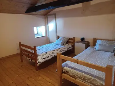 Un ou plusieurs lits dans un hébergement de l'établissement Honeysuckle Cottage at Gites de la Vienne