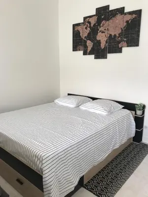Un ou plusieurs lits dans un hébergement de l'établissement Studio 35m2 à 3 km de la gare d Angoulême avec draps et linge de maison fournis