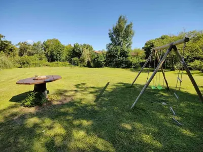 Aire de jeux pour enfants de l'établissement Chambres en maison d'hôtes Le Moulin d'Annepont