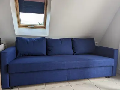 Coin salon dans l'établissement Bel appartement T2 avec balcon, WIFI et parking près de la plage - FR-1-706-2