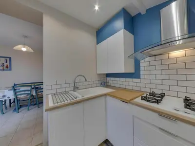Cuisine ou kitchenette dans l'établissement Maison paisible près de la plage, 5 pers, jardin, animaux bienvenus - FR-1-706-7