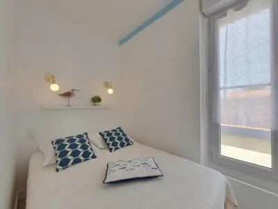 Un ou plusieurs lits dans un hébergement de l'établissement Studio Confort pour 4 pers. proche Plage/Commerces - Châtelaillon-Plage - FR-1-706-1