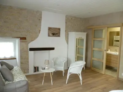 Coin salon dans l'établissement LA LAUJERE Chambre d'hôtes HARMONIE