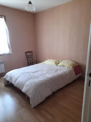 Un ou plusieurs lits dans un hébergement de l'établissement La belle maisonette