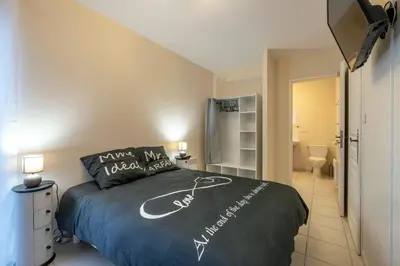 Un ou plusieurs lits dans un hébergement de l'établissement Le Chant du Moulin - Maison avec piscine