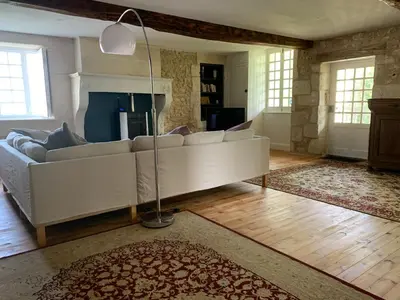 Coin salon dans l'établissement Maison des Roses
