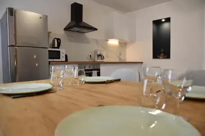 Cuisine ou kitchenette dans l'établissement [Le 8] Maison de ville élégante et tout confort