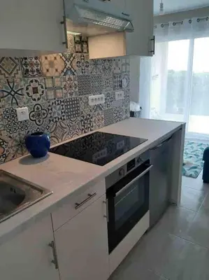 Cuisine ou kitchenette dans l'établissement Studio-terrasse 3* bord de mer Châtelaillon plage