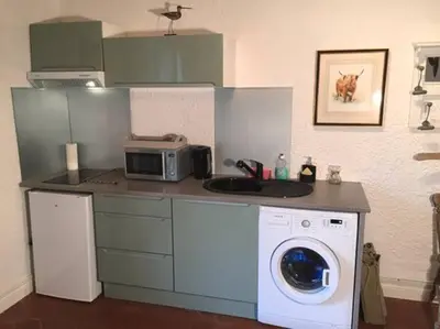 Cuisine ou kitchenette dans l'établissement La Grande Barbotière Villa d'Exception