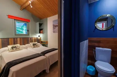 Un ou plusieurs lits dans un hébergement de l'établissement Villa 4* vue mer piscine spa