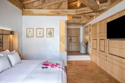 Un ou plusieurs lits dans un hébergement de l'établissement La Nauve, Hôtel & Jardin - Relais & Châteaux