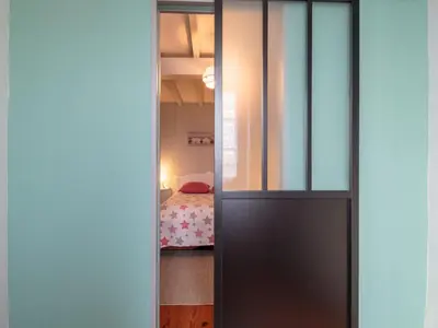 Un ou plusieurs lits dans un hébergement de l'établissement Holiday Home Gîte La Truffière Saintongeaise by Interhome