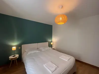 Un ou plusieurs lits dans un hébergement de l'établissement Le Havre Citadin - Maison de ville à Poitiers