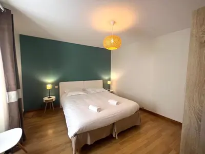 Un ou plusieurs lits dans un hébergement de l'établissement Le Havre Citadin - Maison de ville à Poitiers