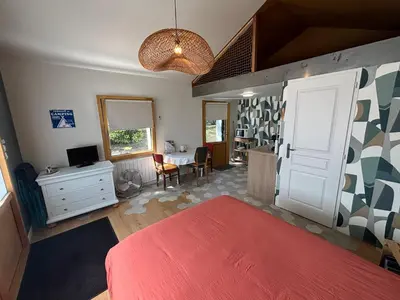 Un ou plusieurs lits dans un hébergement de l'établissement Studio des Lilas