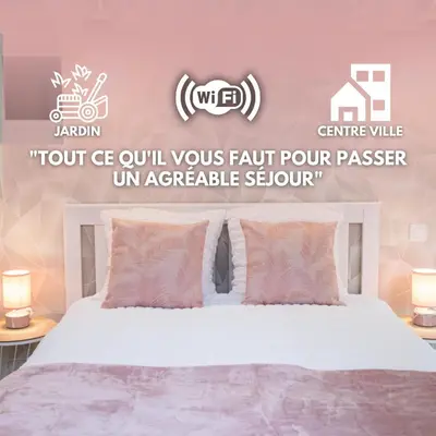 Un ou plusieurs lits dans un hébergement de l'établissement Appartement rénové - wifi - jardin - centre de Niort