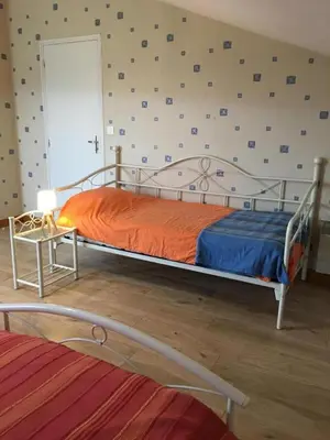 Un ou plusieurs lits dans un hébergement de l'établissement La ferme d'ernest