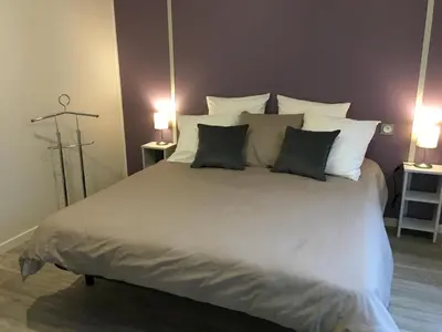 Un ou plusieurs lits dans un hébergement de l'établissement Lilas la vallee des noyers