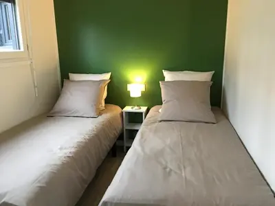 Un ou plusieurs lits dans un hébergement de l'établissement Granny la vallee des noyers