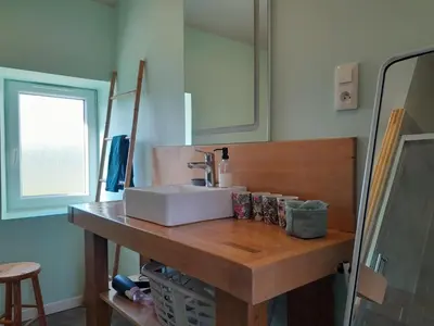 Cuisine ou kitchenette dans l'établissement La bergerie