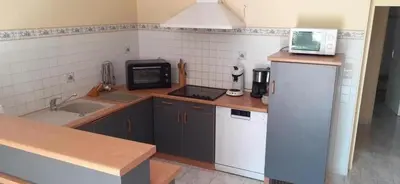 Cuisine ou kitchenette dans l'établissement Les petites chaumes