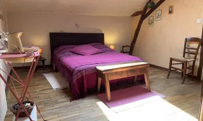 Un ou plusieurs lits dans un hébergement de l'établissement Chez l'antoinette