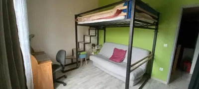 Un ou plusieurs lits dans un hébergement de l'établissement chambre familiale dans maison au calme