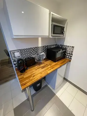 Cuisine ou kitchenette dans l'établissement Le Sunny-hyper centre -proche gare - Paisible -WIFI HD -NETFLIX-Idéal couple business et famille