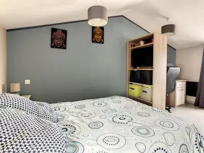 Un ou plusieurs lits dans un hébergement de l'établissement Maison piscine proche La Rochelle