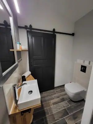Salle de bains dans l'établissement Au Clos Des Dély - Chambre d Hôtes 