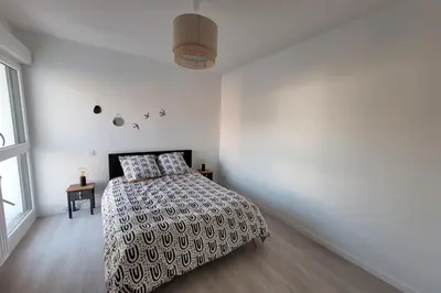 Un ou plusieurs lits dans un hébergement de l'établissement Charming 45m in Aytré - near La Rochelle