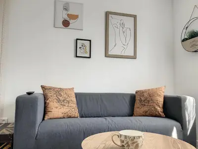 Coin salon dans l'établissement Résidence Appartements Niort wifi-parking
