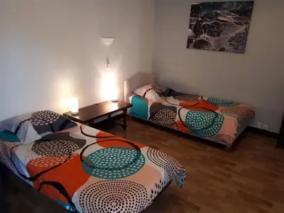 Un ou plusieurs lits dans un hébergement de l'établissement Maison de vacances familiale