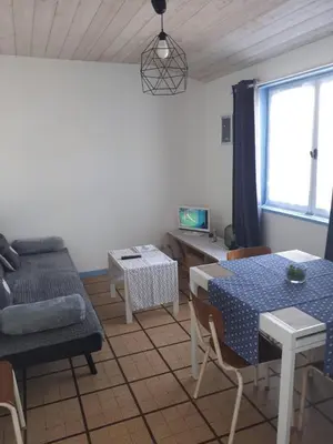 Coin salon dans l'établissement Maison de vacances familiale